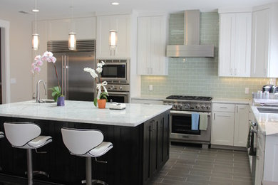 Kitchen - contemporary porcelain tile kitchen idea in San Francisco with quartzite countertops