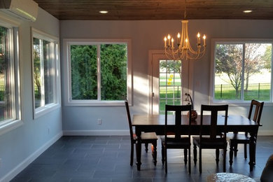 Example of a classic dining room design in Other
