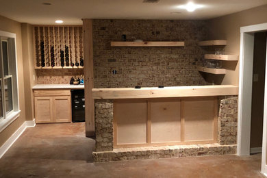 Inspiration for a rustic home bar remodel in Atlanta