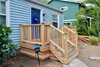 Deck - mid-sized ground level wood railing deck idea in Portland