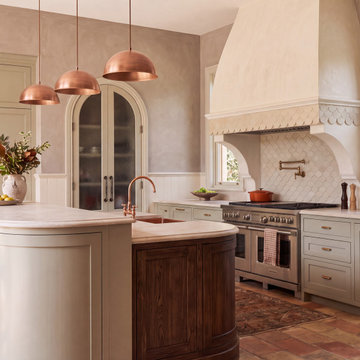 luxury kitchen with warm European character blending French & Italian courtyard