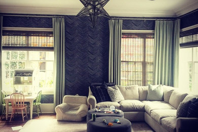 Example of a trendy family room design in Charlotte