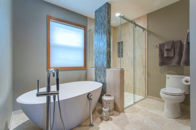 Example of a transitional beige tile and porcelain tile porcelain tile bathroom design in Other with an undermount sink, shaker cabinets, dark wood cabinets, quartz countertops and a one-piece toilet