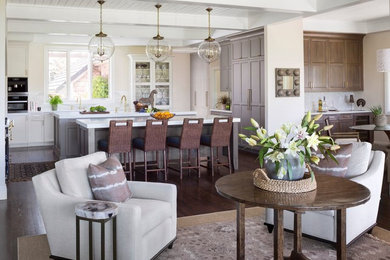 Kitchen - transitional dark wood floor and brown floor kitchen idea in Denver with gray cabinets, quartz countertops, gray backsplash, limestone backsplash, paneled appliances and two islands