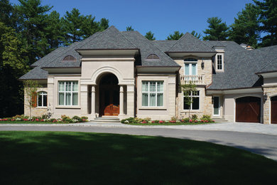 Traditional Home with Cast Stone Trim and Stone Veneer