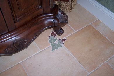 Ceramic tile entryway photo in Boston