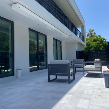 Contemporary Poolside Retractable Awning Installation