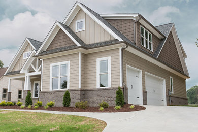 Example of a transitional exterior home design in Raleigh