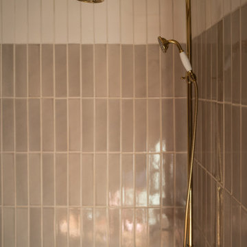 The Hunter Houses Neutral Tile Tub Surround