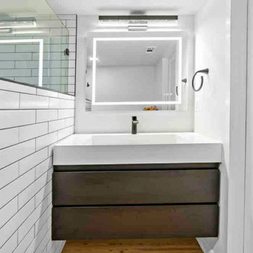 Bathroom Trio & Laundry Room Updates Transform McLean Home