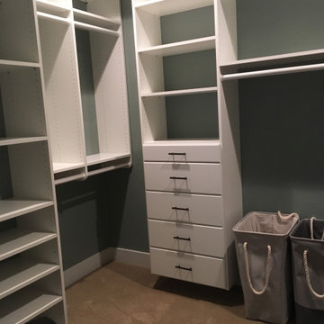 Master closet in white with 96" top shelf