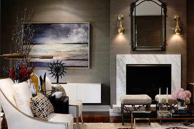 Large transitional formal enclosed living room in Melbourne with brown walls, medium hardwood floors, a standard fireplace, a stone fireplace surround and no tv.