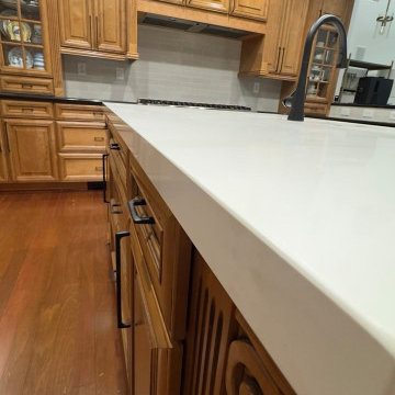 Classic Wood Kitchen with Modern Glass Backsplash