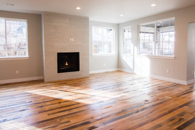 Example of a transitional family room design in Denver