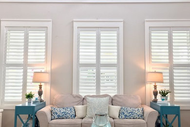 Beach style living room photo in New York