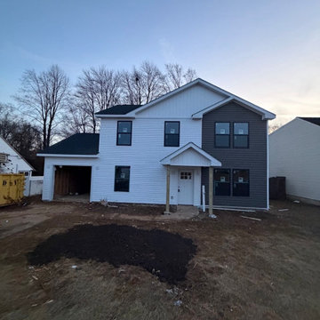 Wood composite and vinyl siding exterior