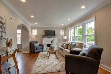 Living room - modern living room idea in St Louis