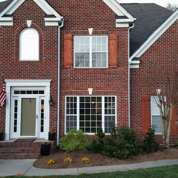 Exterior Shutters and Wall-Mounted Pergola