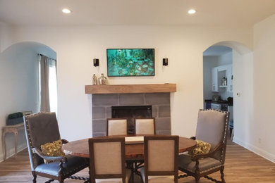 Example of a transitional dining room design in Other