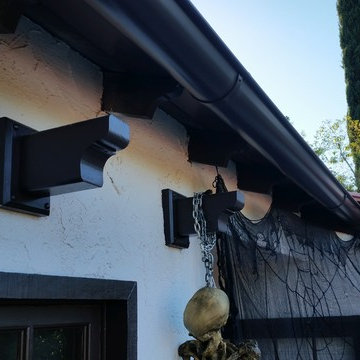 Half Round Rain Gutters with Wrap Around 10 Gauge Twisted Rafter Mount Brackets
