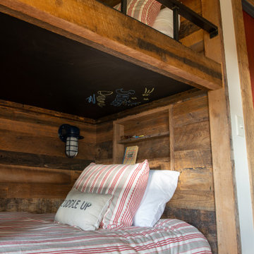 Reclaimed Wood Paneling and Bunk Posts in Rustic Cabin Bunkroom