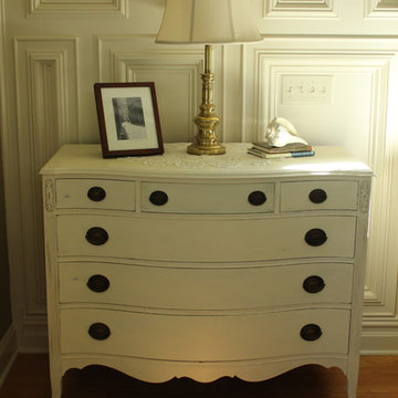 Chalk painted furniture complements this accent wall.