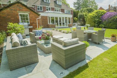Design ideas for a contemporary patio in Surrey.