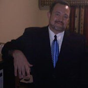 John Ducass foto