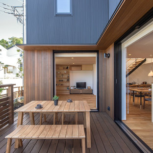 他の地域のアジアンスタイルのおしゃれなデッキ (日よけなし) の写真