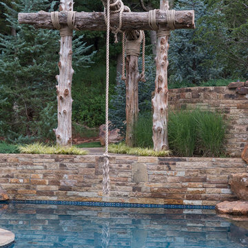 Multi-Level Pool with Rope Swing, Sunken Fire Pit, Waterfalls & Swim Up Bar