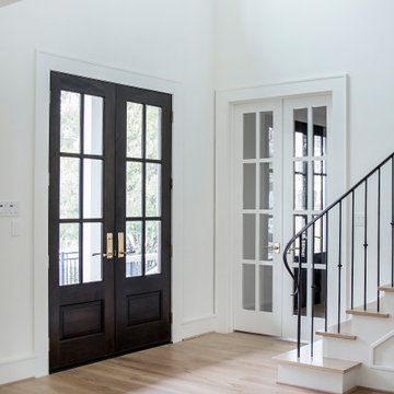 Clean & Modern White Farmhouse on E. 10th St.