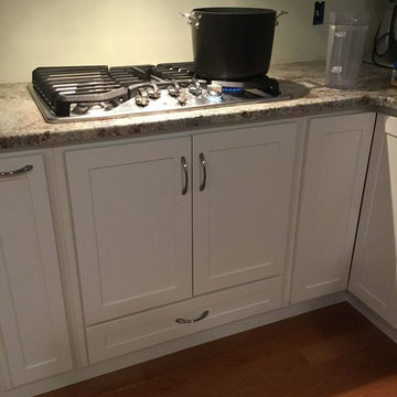 Kitchen Painted White Mission Doors, Bottom Drawer in cooktop cabinet