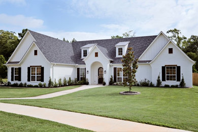 Inspiration for a transitional white one-story exterior home remodel in Dallas with a mixed material roof