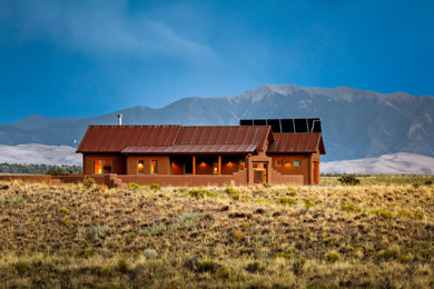 Example of a southwest exterior home design in Denver