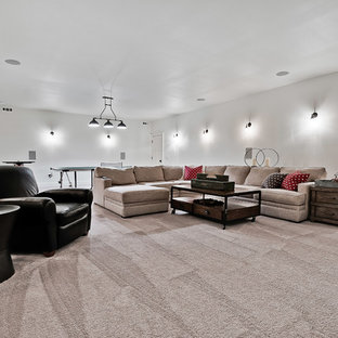 Huge arts and crafts enclosed ceramic floor and beige floor home theater photo in Other with white walls and a wall-mounted tv