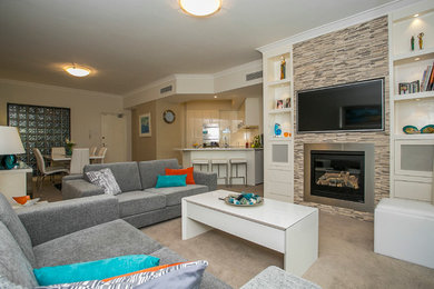 Mid-sized contemporary open concept living room in Perth with beige walls, carpet, a standard fireplace, a metal fireplace surround and a built-in media wall.