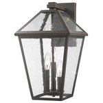 Z-Lite - Z-Lite 579B-ORB Talbot 3 Light Outdoor Wall Sconce in Oil Rubbed Bronze - Illuminate an exterior front or back yard space with a classic fixture reflecting a charming village theme. Made from Rubbed Bronze metal and seeded glass panels, this three-light outdoor wall sconce brings a design-forward look to wrap up a tasteful and functional yard space.