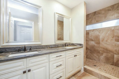 Bathroom - large transitional master orange tile and porcelain tile porcelain tile and orange floor bathroom idea in Tampa with recessed-panel cabinets, white cabinets, white walls, an undermount sink, granite countertops and gray countertops