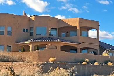 Southwestern exterior home idea in Albuquerque