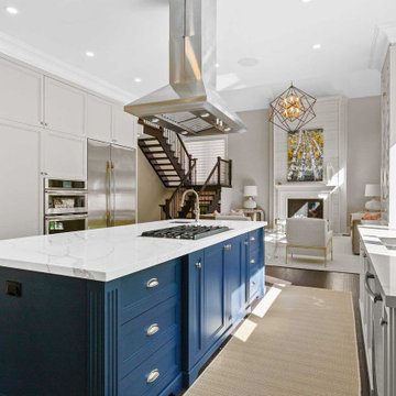 Modern spacious kitchen with navy blue accent