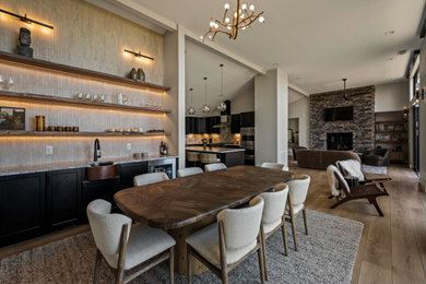 Example of a transitional dining room design in Other