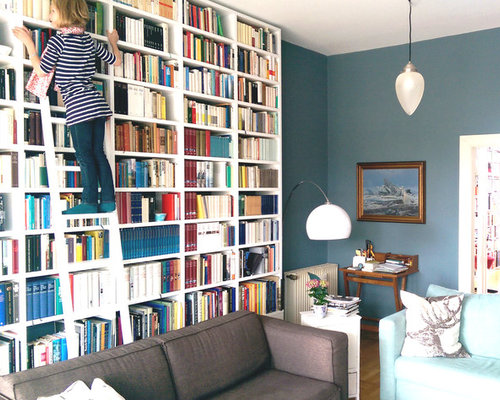 GANTZ Bücherwand mit Leiter nach Maß für große Büchersammlung GANTZ Bücherwand mit Leiter nach Maß für große Büchersammlung