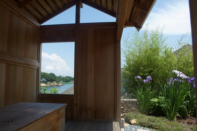 Inspiration for a small asian full sun backyard landscaping in Bridgeport.