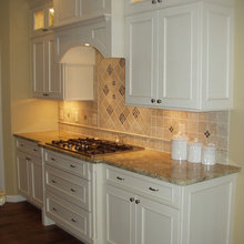 white cabinet/ tan counter