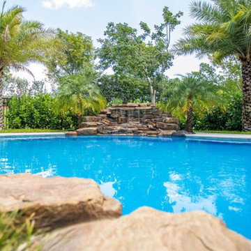 Freeform Custom Pool and Spa with Rock Waterfall in Parkland, Florida
