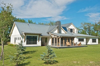 Farmhouse exterior home idea in Other
