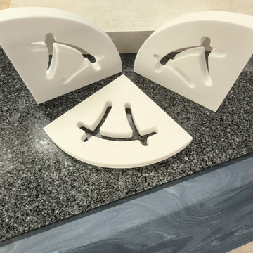 Solid Surface shower and bath solutions.