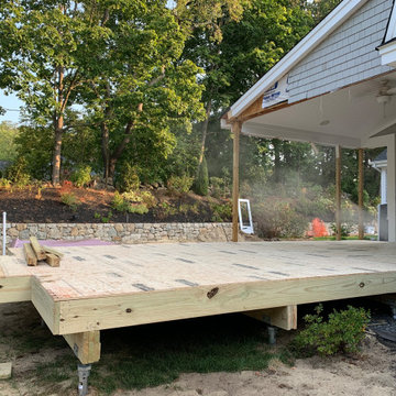 Three season porch expansion and backyard oasis