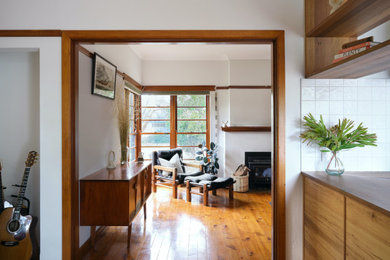 Design ideas for a midcentury living room in Canberra - Queanbeyan.