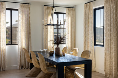 Mid-sized transitional medium tone wood floor and brown floor dining room photo in Atlanta with white walls and no fireplace